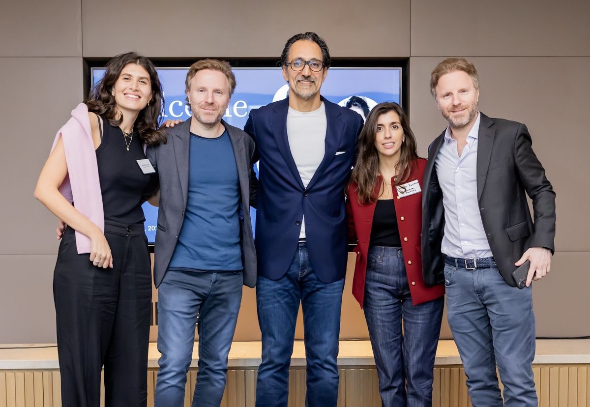 Five members of the BY Venture Partners community standing together on stage